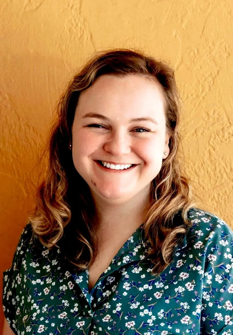 This is a picture of Jessica McClain, LCSW, a therapist at Heart of Texas Therapy Services who specializes in anxiety and OCD. She has a warm smile.