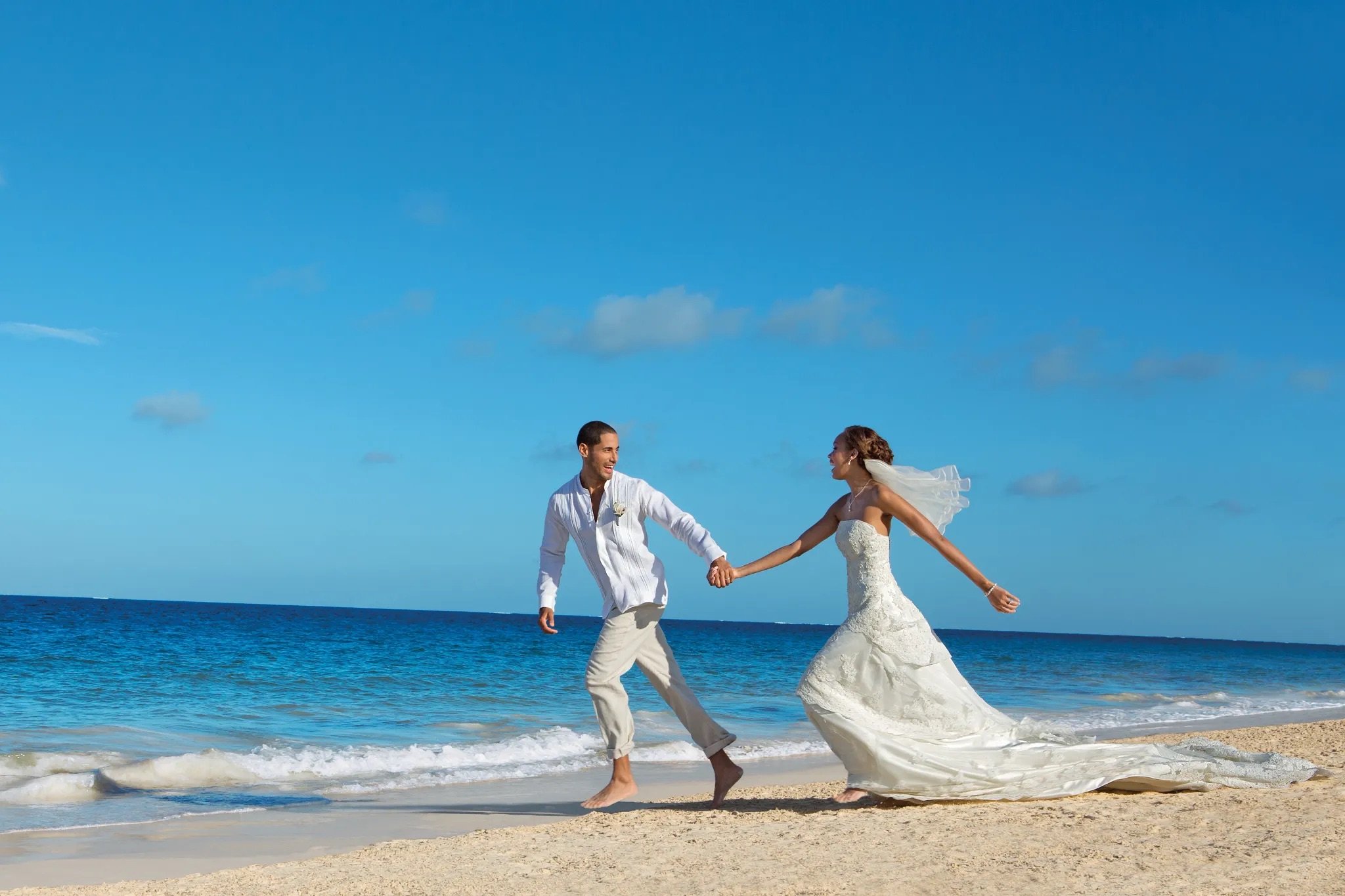 DRSRC-WED-Bride-Groom-RunningToSea1-2-CB.jpeg