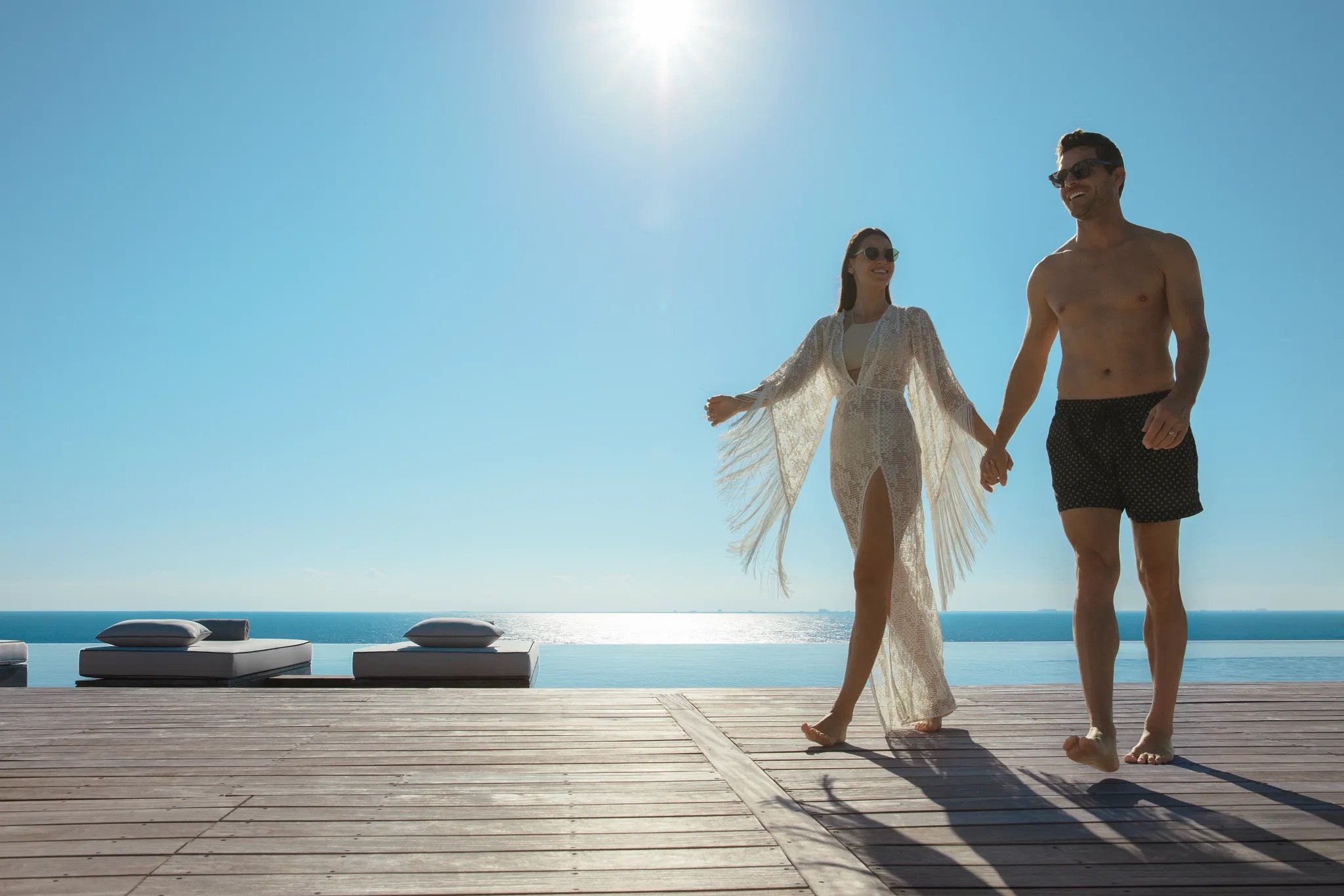 SECIM-EXT-Couple-RooftopPool-Walking-1A-CB.jpeg