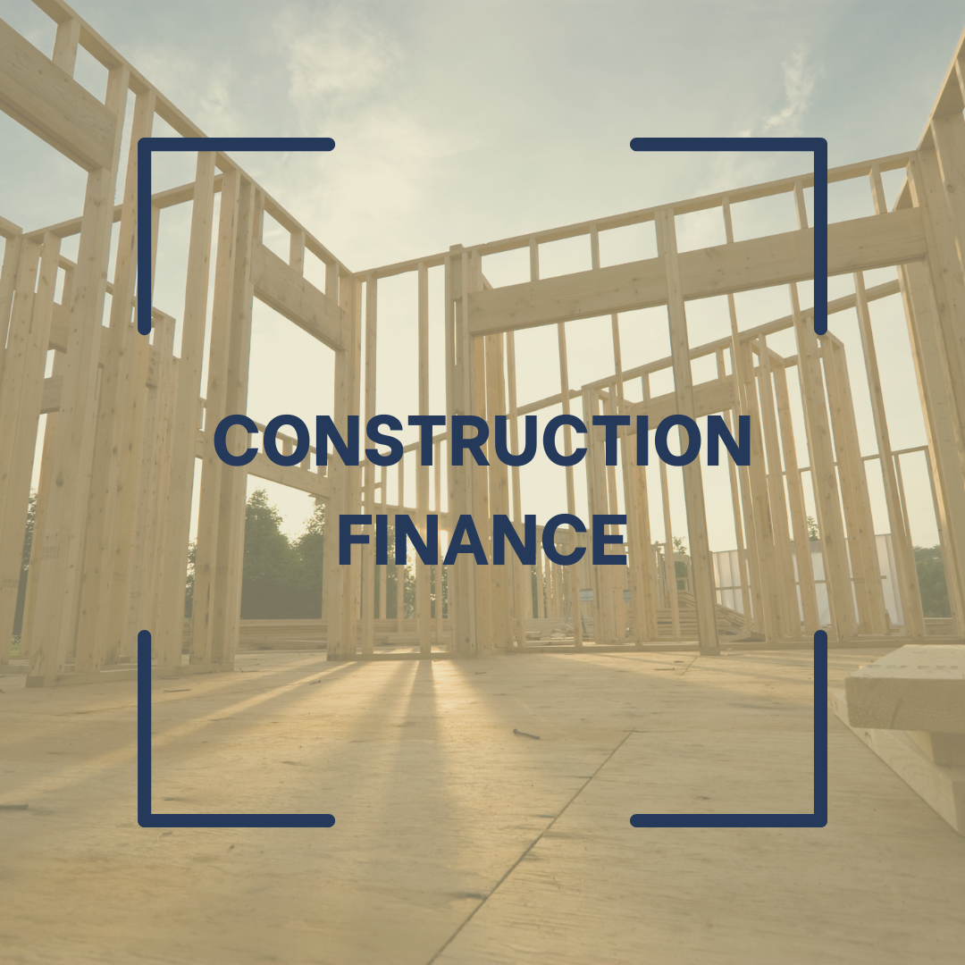 Construction site with wooden framing for a building under construction, with the words 'Construction Finance' overlaid.