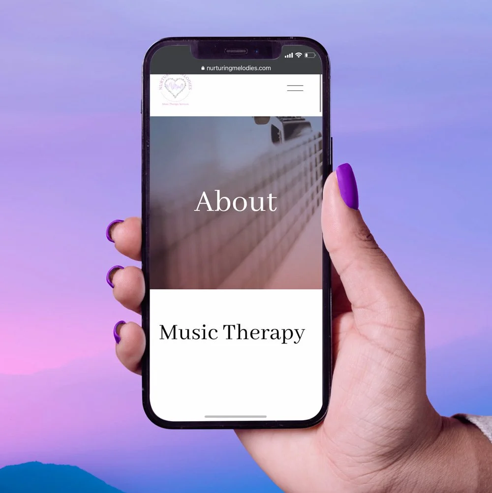Hand holding a smartphone displaying a webpage with the text 'About Music Therapy' on a cloudy sky background.