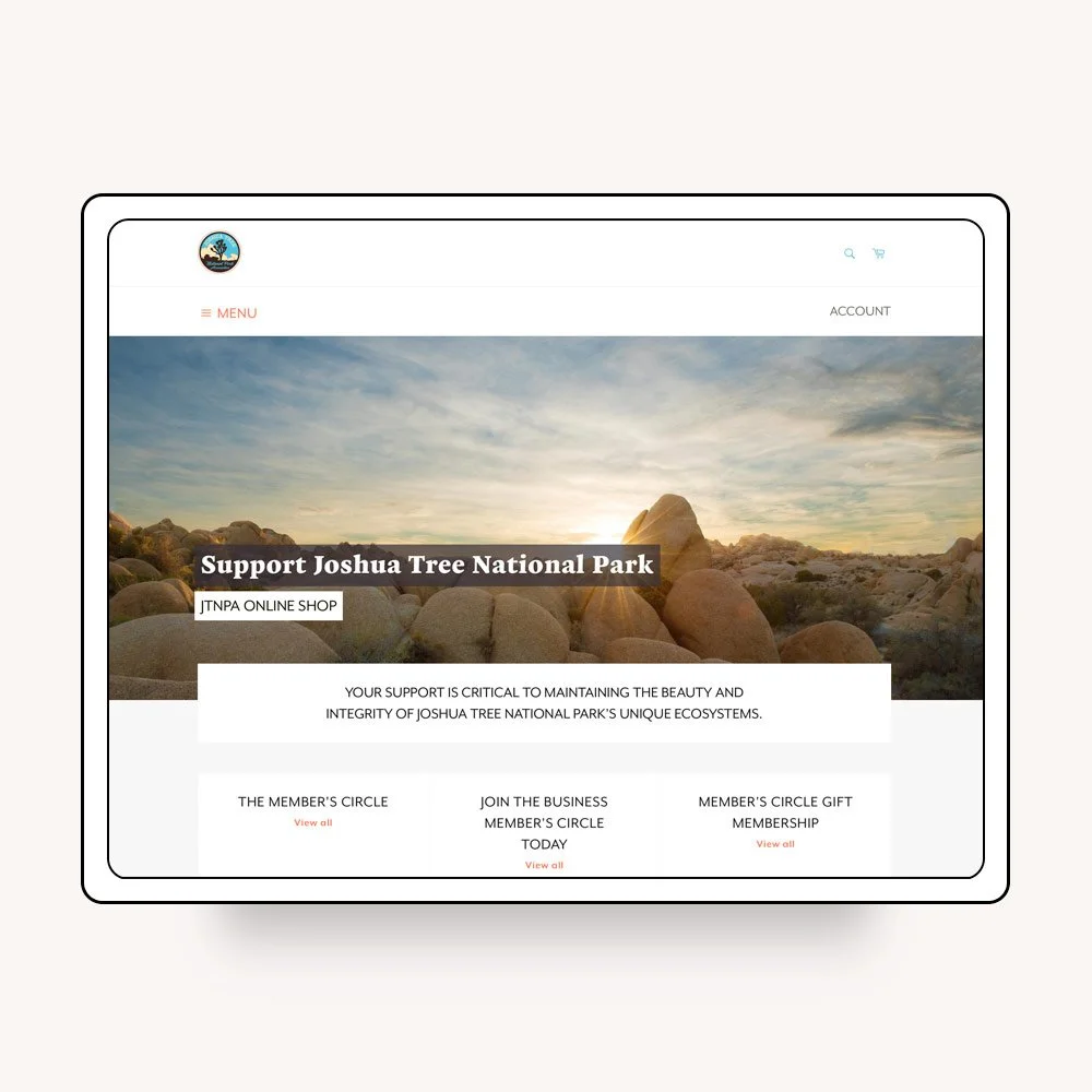 Website homepage supporting Joshua Tree National Park Association, featuring a rocky landscape with a sunset sky.