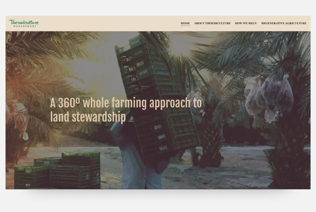 A person carrying crates of produce in an agricultural setting with palm trees and a sunset.