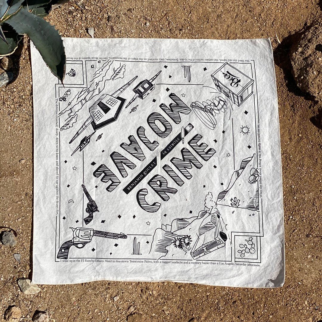 Black and white illustrated book cover or poster titled 'Mojave Crime' by Benjamin Goulet, featuring drawings of a desert cabin, a gun, a car, cactus, mountains, and other objects, on the ground outdoors.