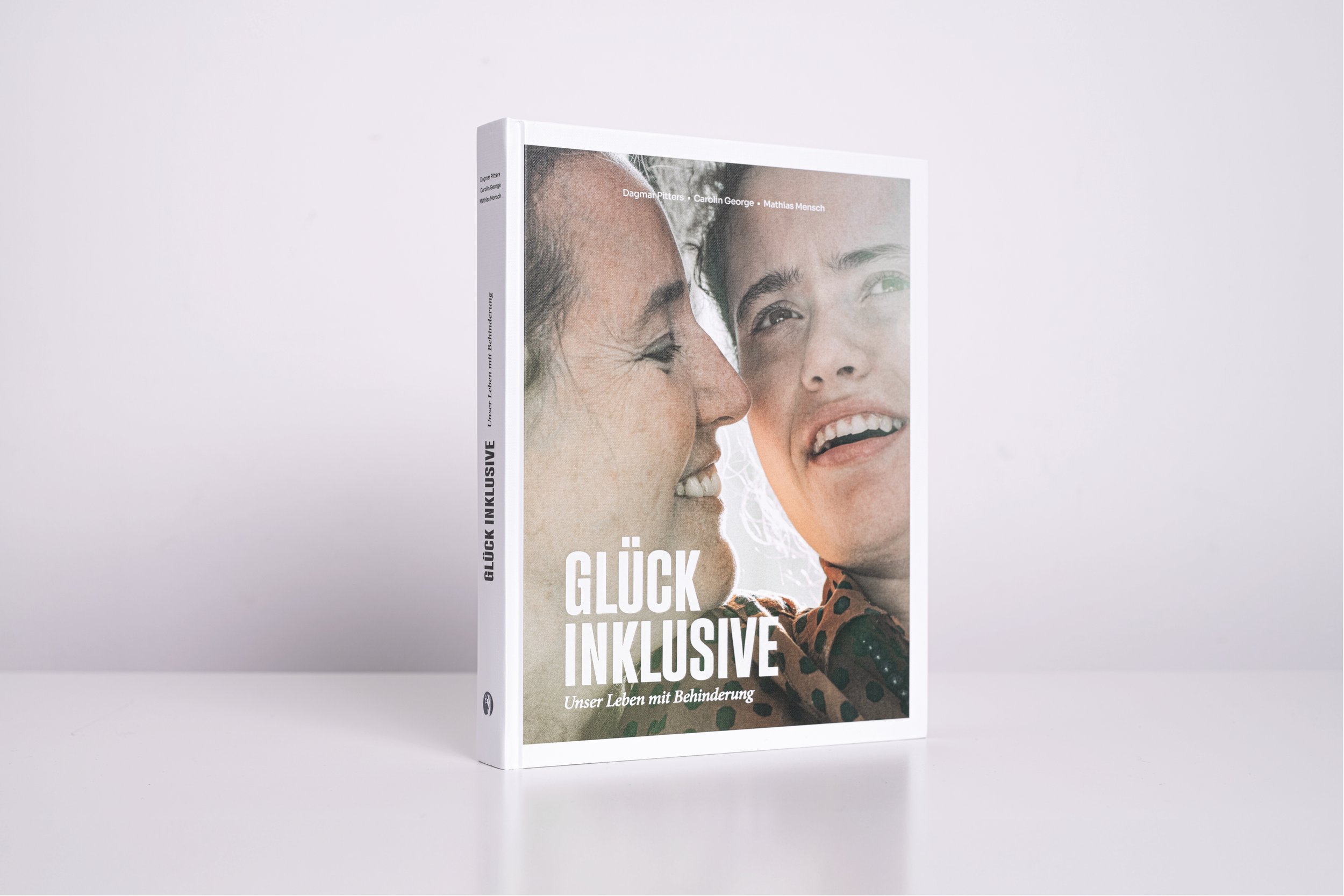 Glück inklusive – Unser Leben mit Behinderung. Das Buch Cover Teil 1. Fotografiert von Mathias Mensch.