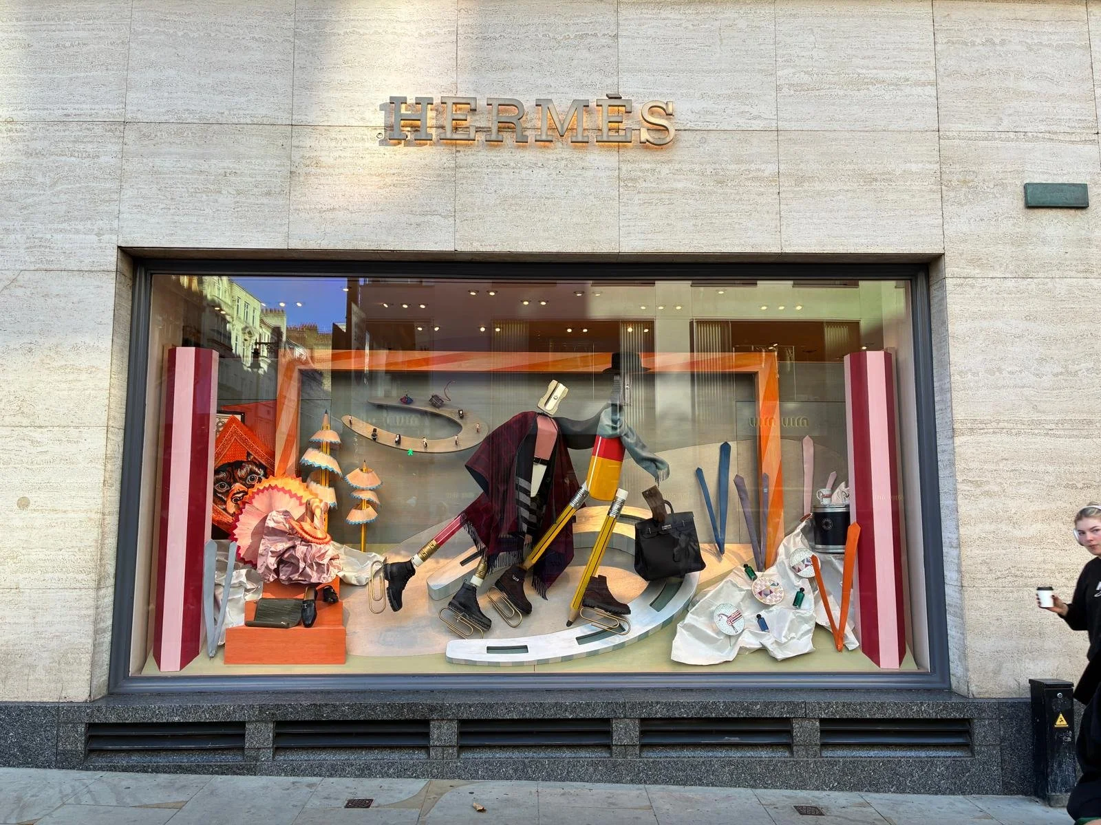Detail of oversized pencil prop with veneer shavings and ice skater figure made from enlarged 3D-printed pencil sharpener and rubber, created for Hermès Christmas window display.