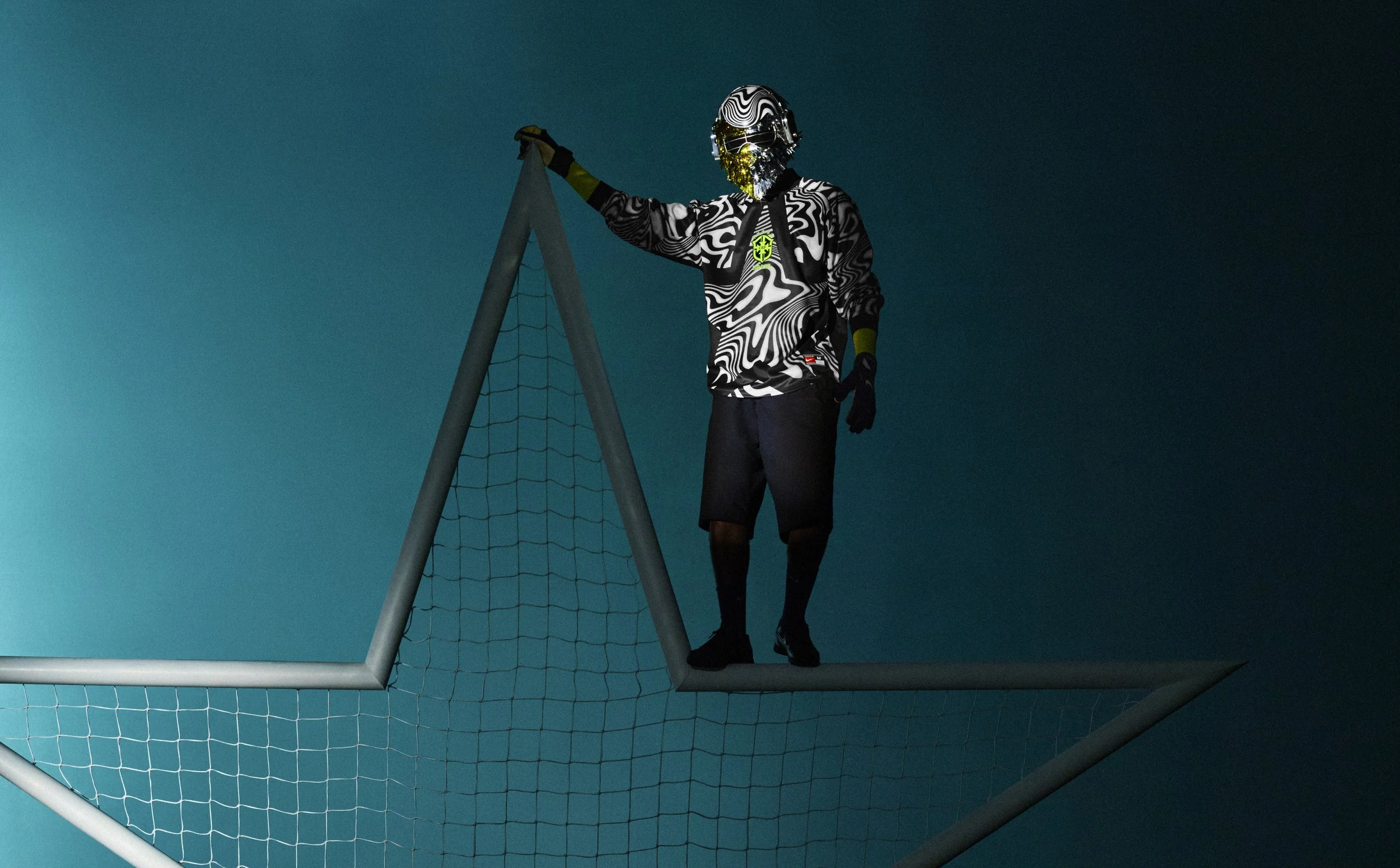 Image of the Nike football hollywood keeper shirt for Brazil, with the model wearing the custom mask/helmet we created for the shoot