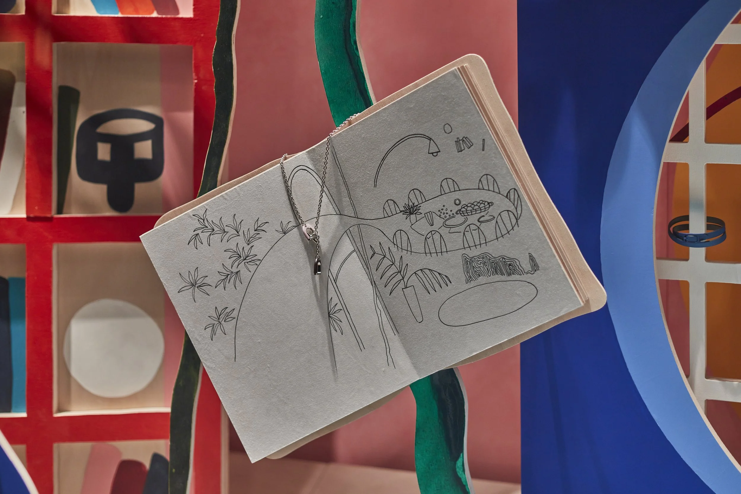 Close-up images of the hand-painted architectural forms, foliage elements and display features we fabricated for the Hermès “Internal Landscapes” windows, including product styling within the set. These details showcase our capabilities in fine-finis