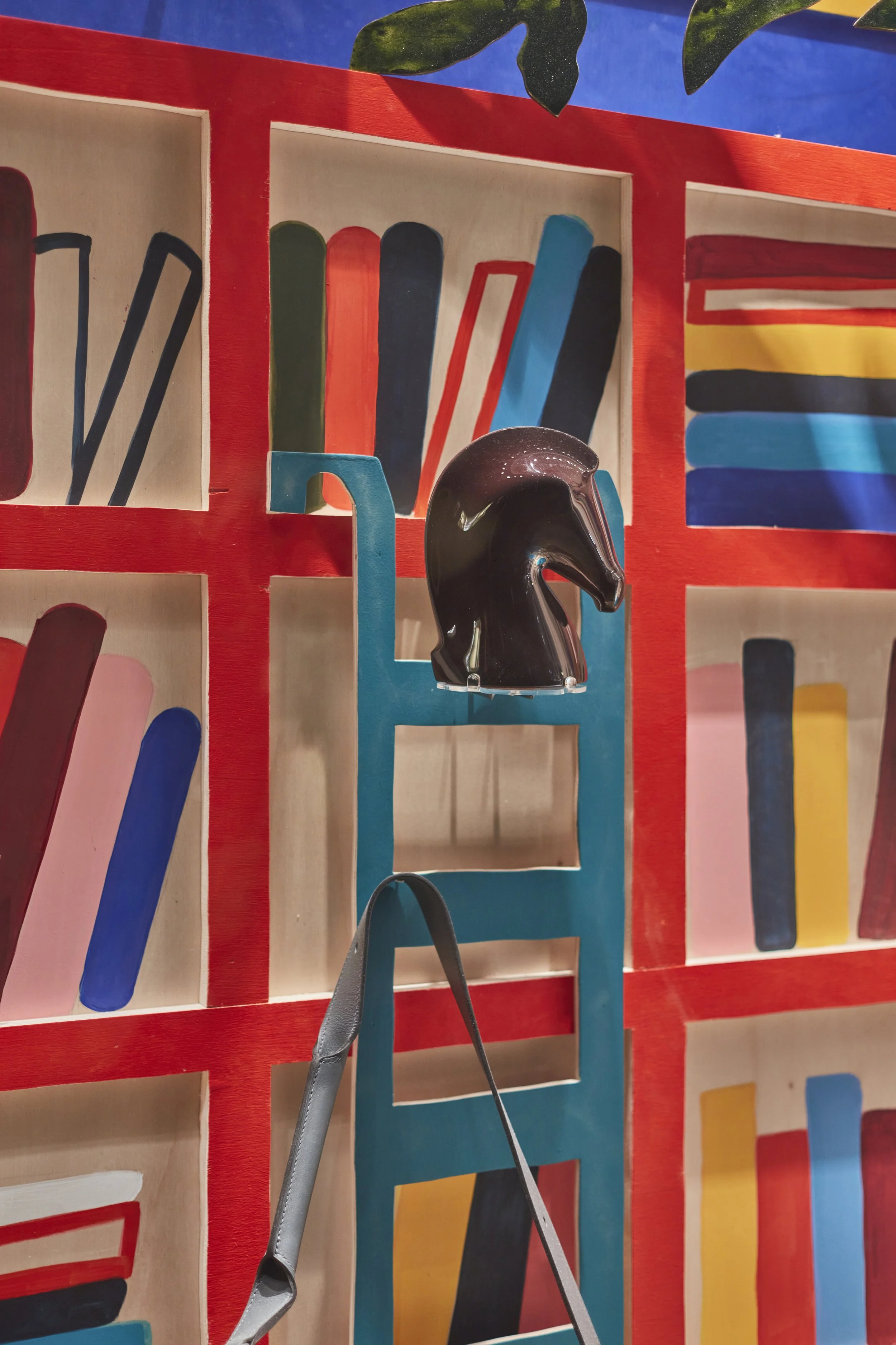 Close-up images of the hand-painted architectural forms, foliage elements and display features we fabricated for the Hermès “Internal Landscapes” windows, including product styling within the set. These details showcase our capabilities in fine-finis