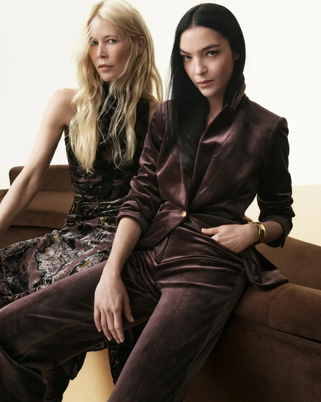 image of Claudia Schiffer and Mariacarla Boscono for Donna Karan: Woman to Woman. Sat on the custom sofa that we made 