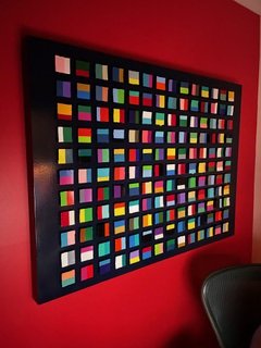 Contemporary geometric abstract wall art composed of hundreds of dimensional color-blocked square elements arranged in a structured grid. Featuring bold saturated hues, sculptural depth, and glossy resin finishes, the piece explores rhythm, repetitio