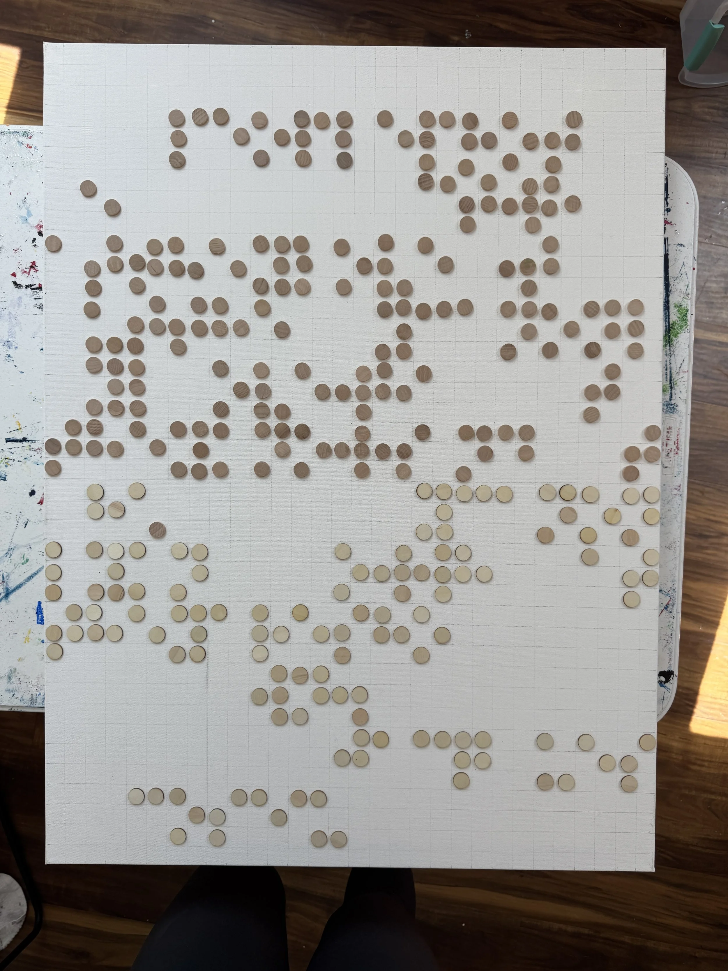 Each braille piece is laid out, shifted, moved, and rearranged until the balance of the words and space feel natural. 