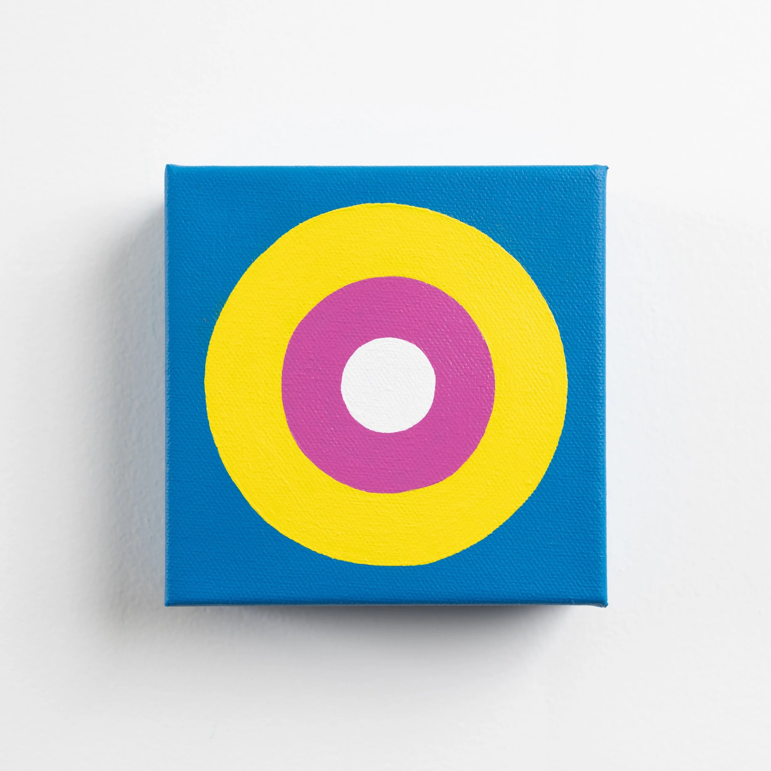 Taking Aim is an ongoing geometric series exploring focus, intention, direction, and personal momentum through bold bullseye compositions and vibrant color relationships. Balancing simplicity with precision, each piece examines the quiet power of kee