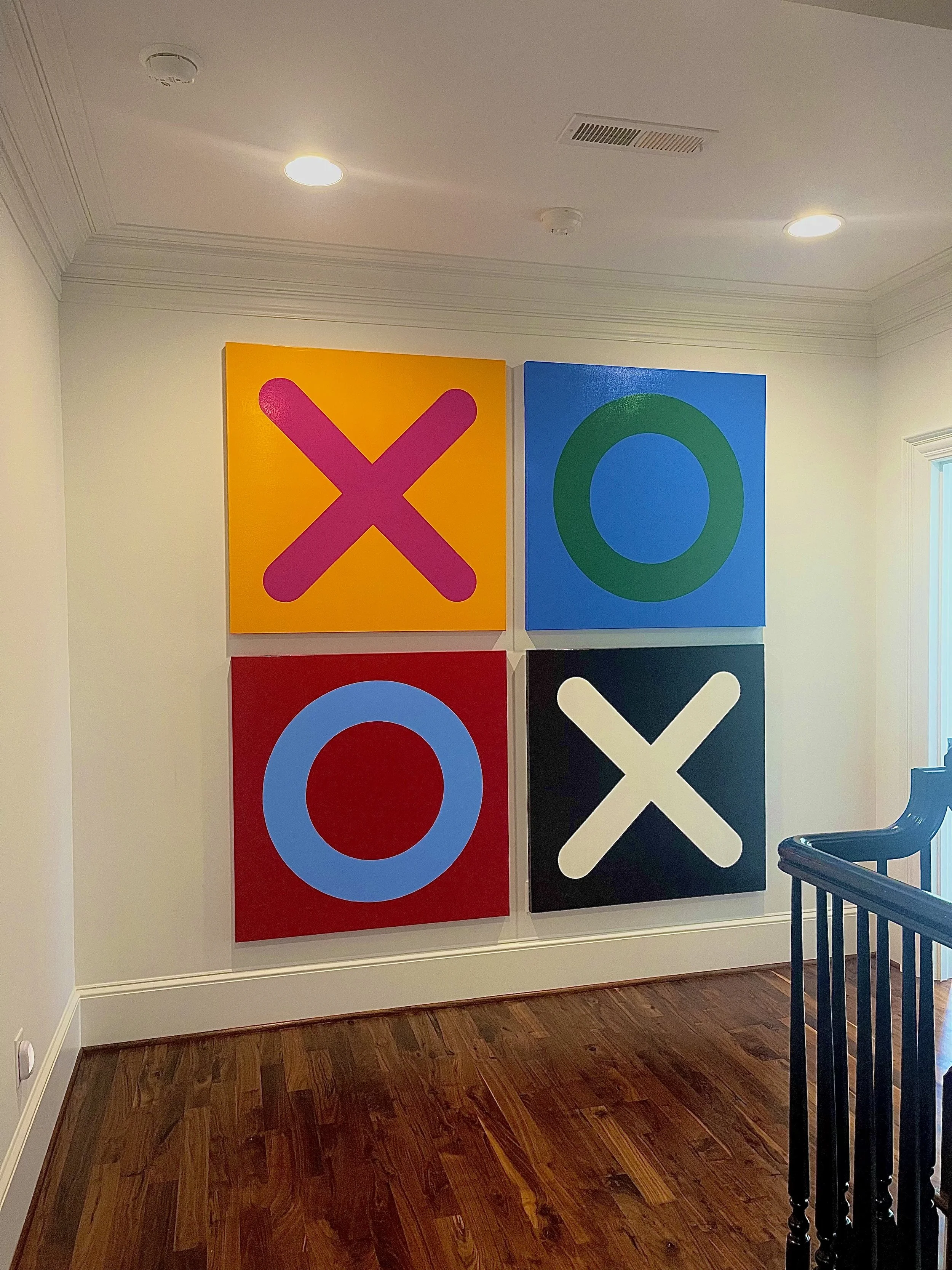 The XOXO Series explores connection, presence, and a daily reminder that love matters. Through bold geometric forms, vibrant color, and large-scale simplicity, each piece brings energy and warmth into the home while creating a striking visual stateme