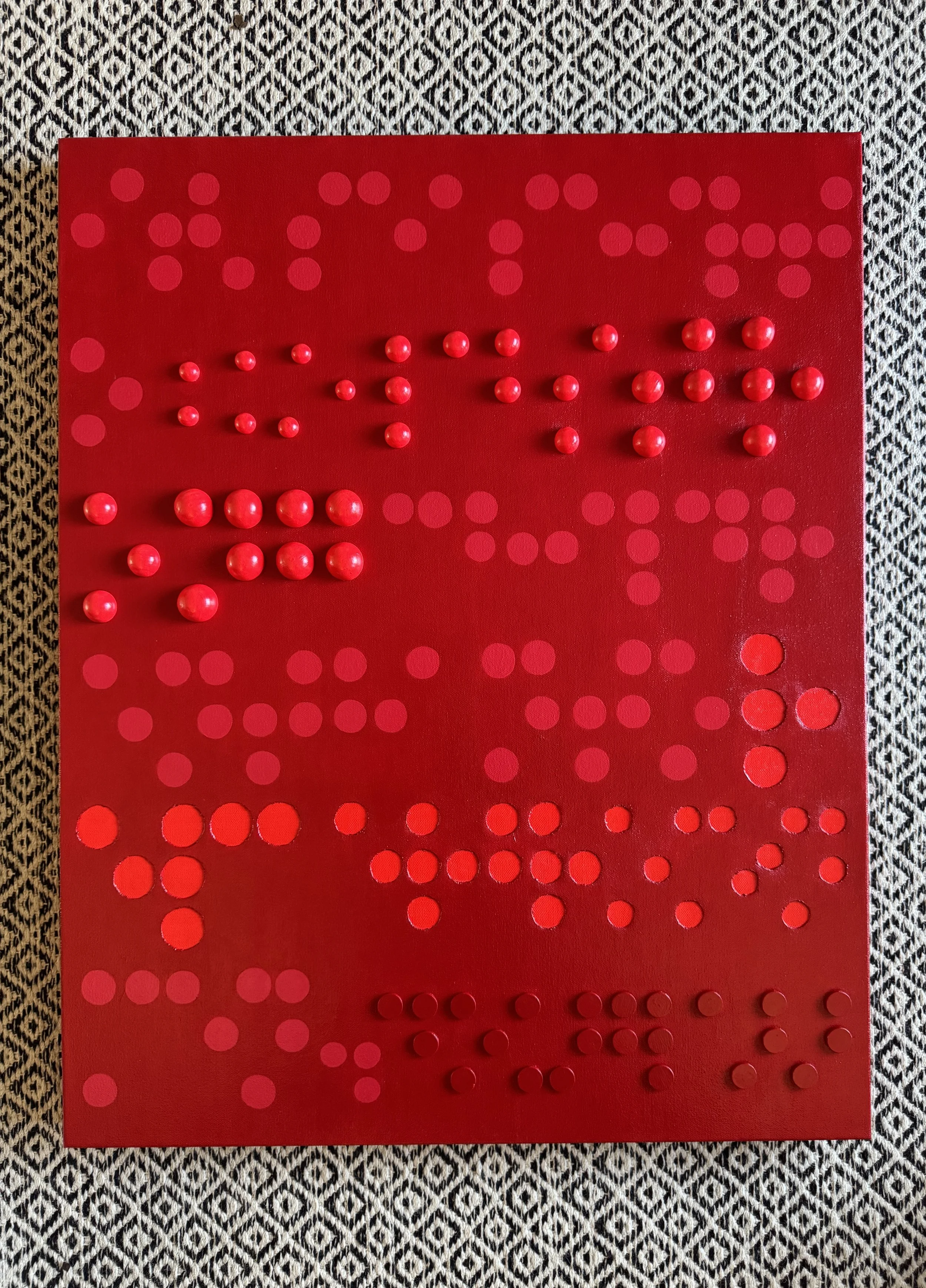 Contemporary Braille-inspired artwork by Merrill Moore featuring layered dimensional elements, cut canvas details, and a Frederick Douglass quote exploring the importance of early childhood support, prevention, and strong foundations. Brick red abstr
