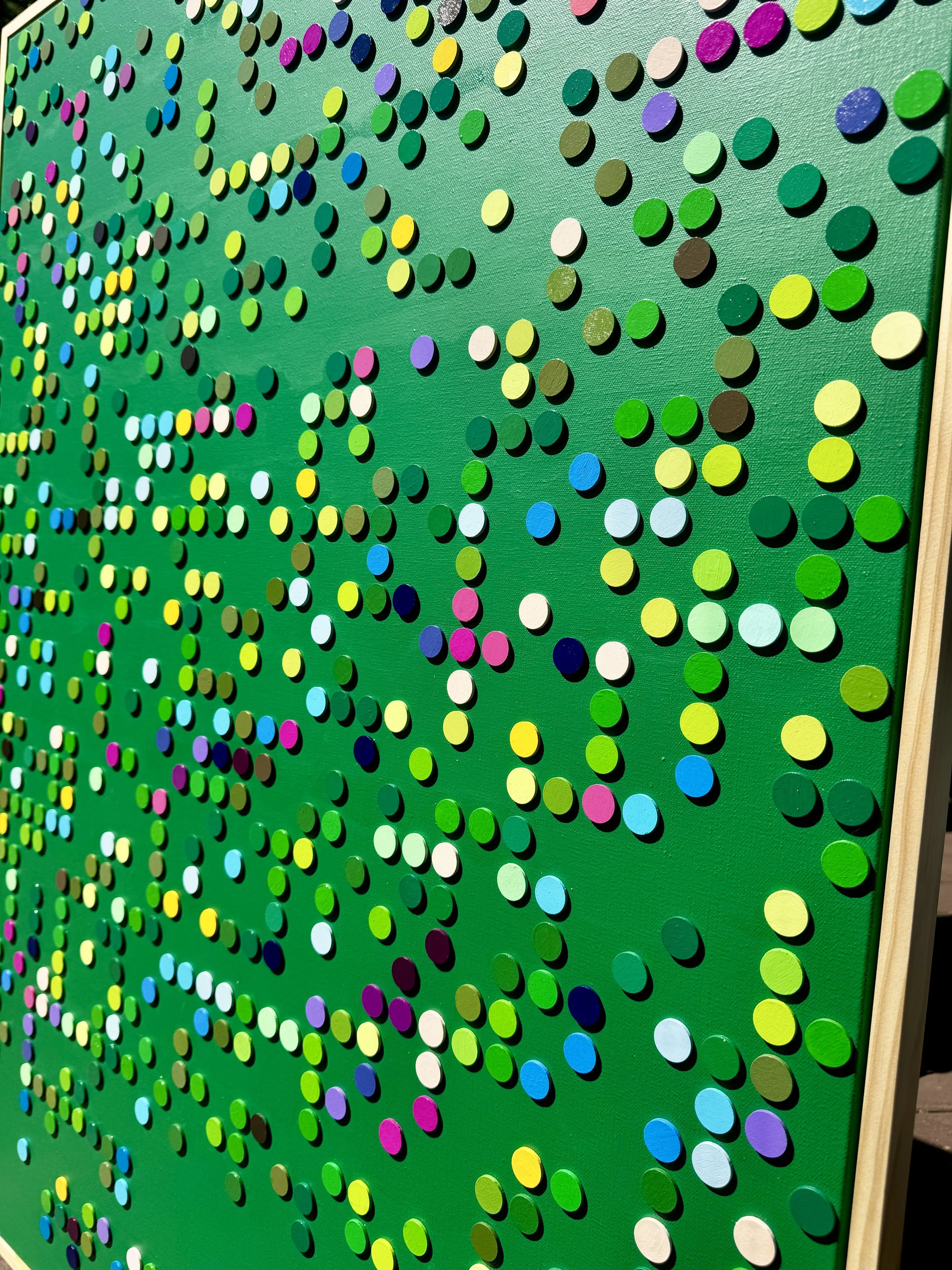 Contemporary Braille artwork inspired by David Attenborough’s quote on environmental stewardship. Layered circles in vibrant greens, blues, yellows, and pinks evoke the experience of looking up through a forest canopy—light, shadow, leaves, and bloss