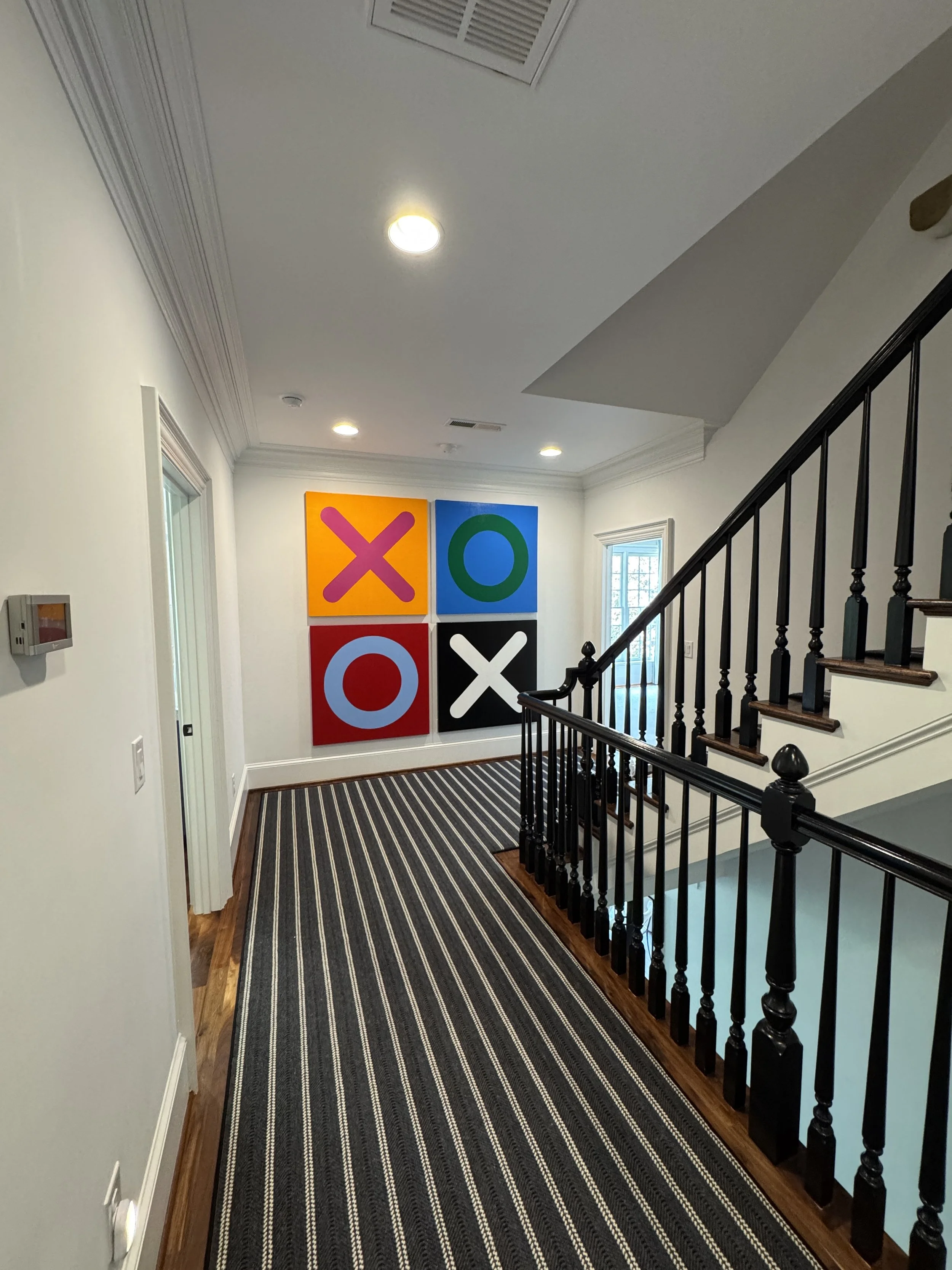 The XOXO Series explores connection, presence, and a daily reminder that love matters. Through bold geometric forms, vibrant color, and large-scale simplicity, each piece brings energy and warmth into the home while creating a striking visual stateme