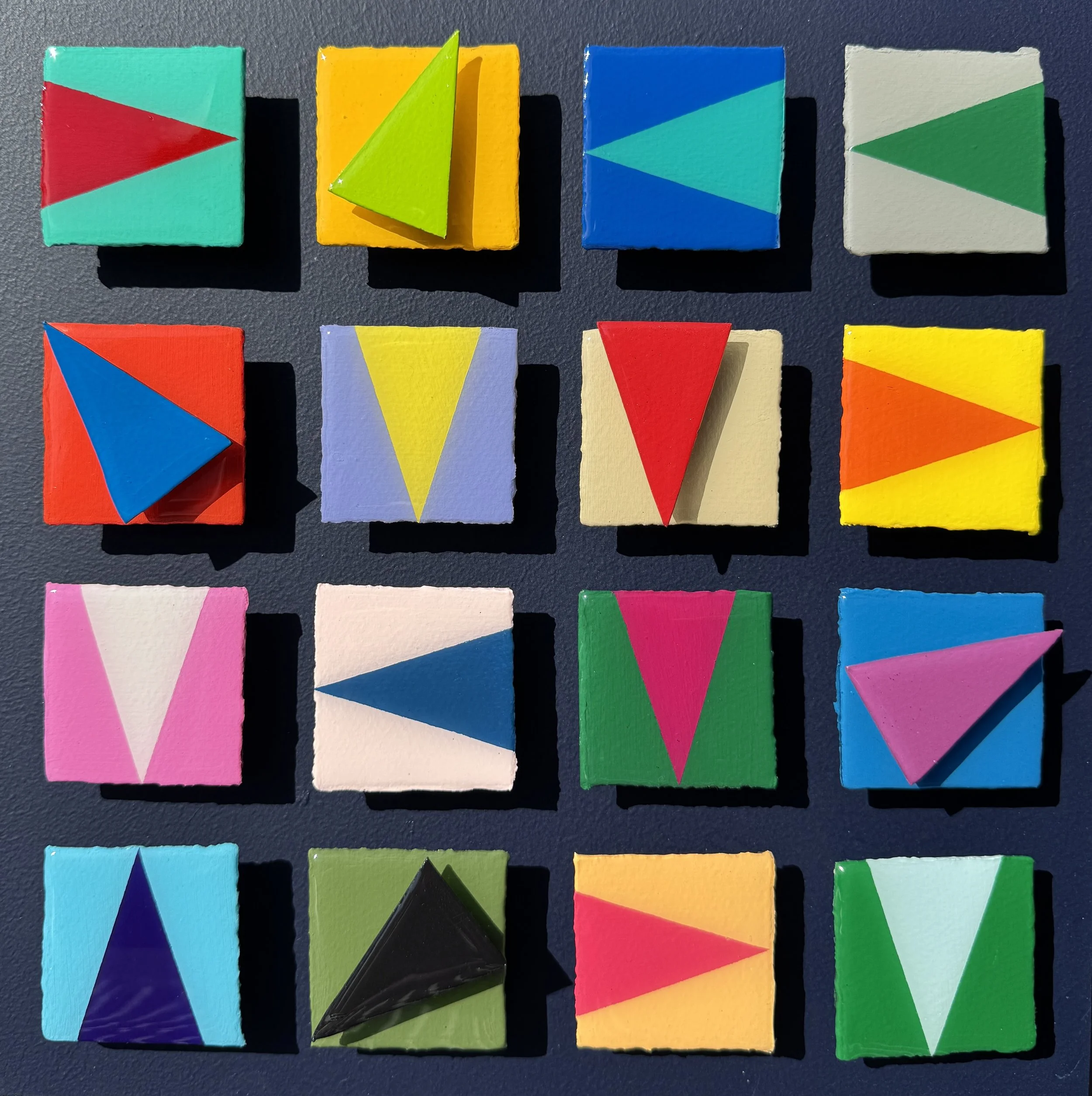 Contemporary geometric abstract artwork featuring dimensional triangular forms, bold color blocking, and layered sculptural depth. Inspired by nautical signal flags and modern design, the composition explores movement, direction, balance, and visual 