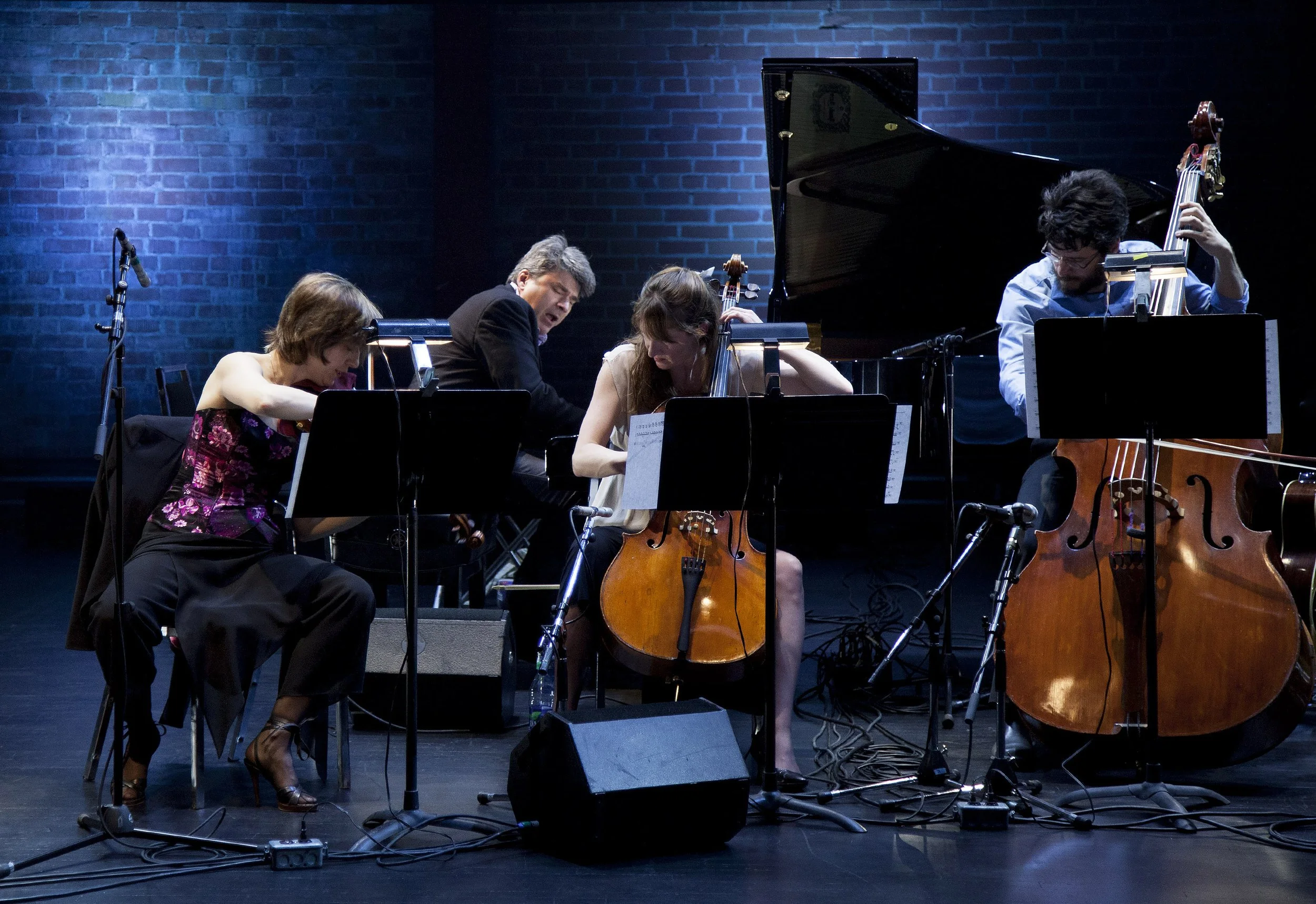  From left to right: Erika Raum, Andrew Burashko, Amy Laing, Joseph Phillips Photo by John Lauener 