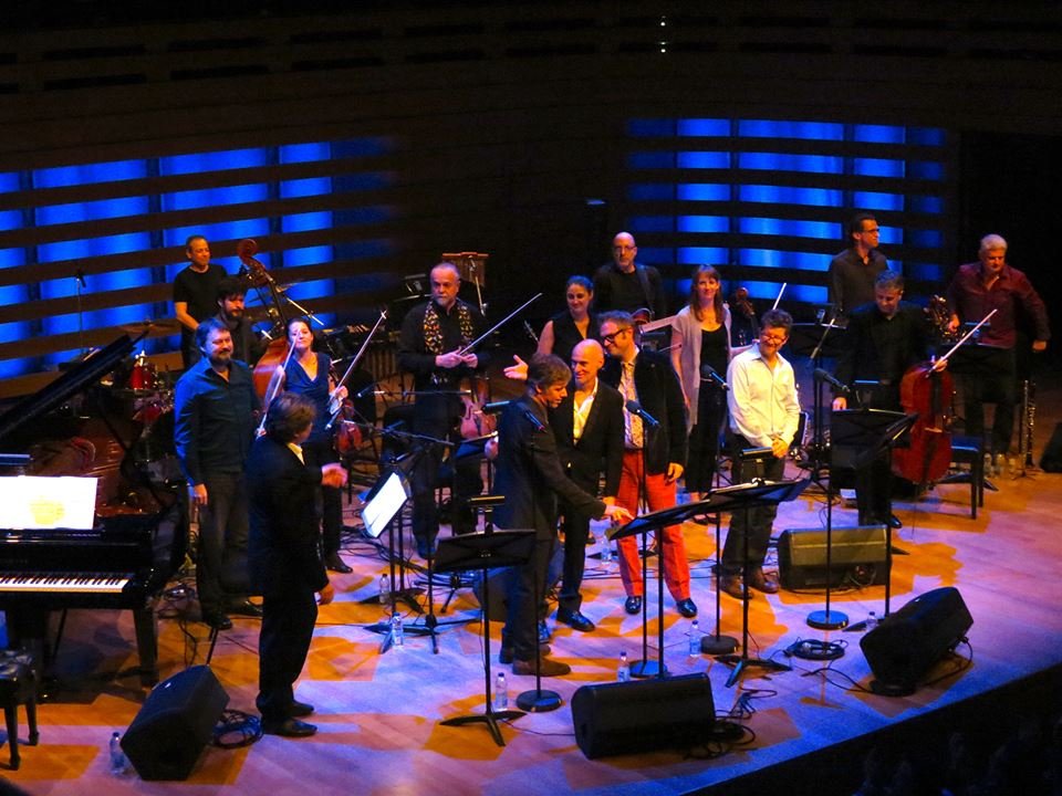  From left to right: Andrew Burashko, Stephen Sitarski, Joseph Phillips, Rick Sacks, Veronique Matthieu, Douglas Perry, Craig Northey, John Mann, Steven Page, Carolyn Blackwell, Andy Maize, Amy Laing, Rob Piltch, Alastair Eng, Larry Larson, John John