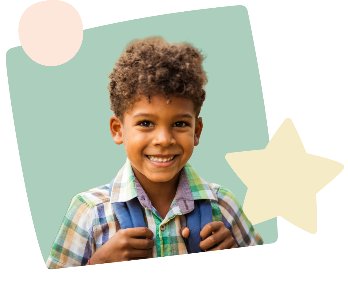 Happy child smiles while holding a backpack on a background of fun colorful shapes