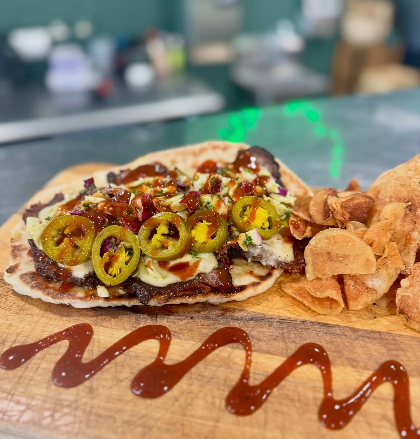 Servin&rsquo; up a brisket special made Chop Shop style.

Come try the Smoked Brisket Flat Bread. Piles of smoked prime brisket, pepper jack cheese, pickled jalape&ntilde;os, arugula chimi slaw, and BBQ sauce all stacked on our house garlic herb flat