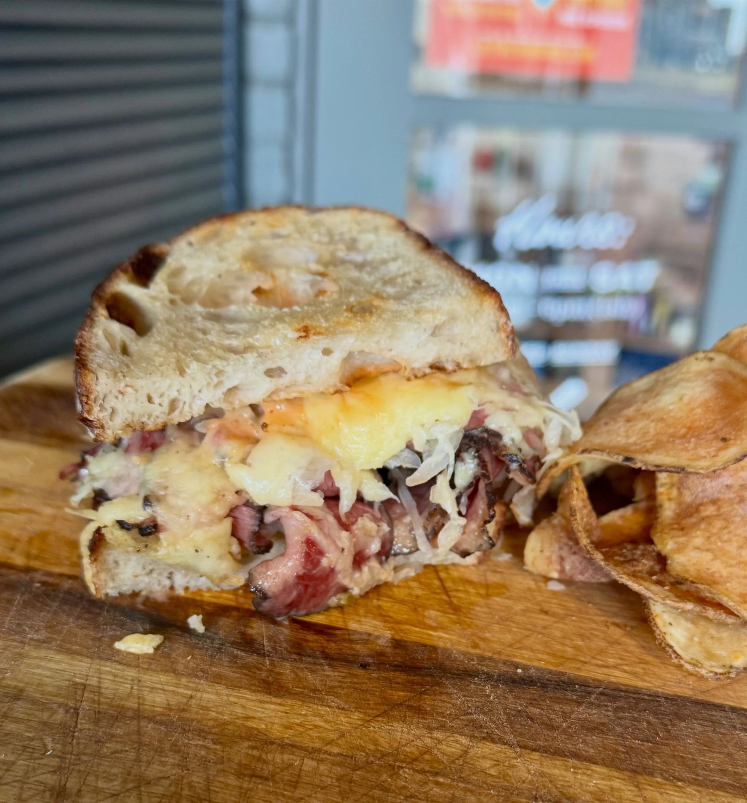 Hot pastrami is back, pard!

Thin-sliced pastrami grilled up with sauerkraut, melty Swiss cheese, and Russian dressing, all layered onto our cold-fermented sourdough.

Per usual, it comes served with beef tallow fried potato chips.

Come get your han