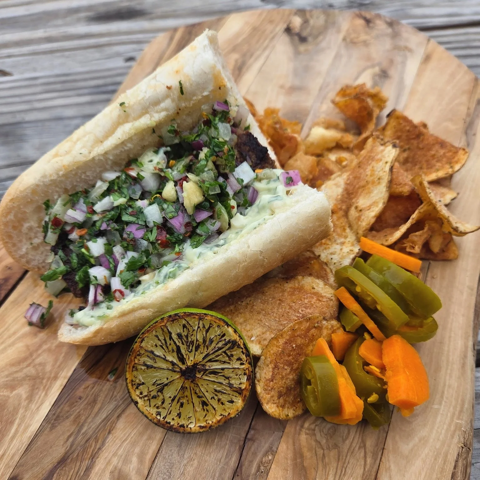 This ain&rsquo;t your average hot dog, folks.

The Chorip&aacute;n Sausage Dawg brings the flavor! We&rsquo;re taking a house-made Argentinian-style red wine chorizo link loaded onto Leidenheimer French bread with smoked garlic mayo and chimichurri. 