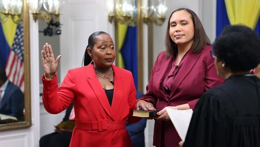 LADY IN RED: USVI TOURISM COMMISSIONER’S POWER SUIT POWER PLAY