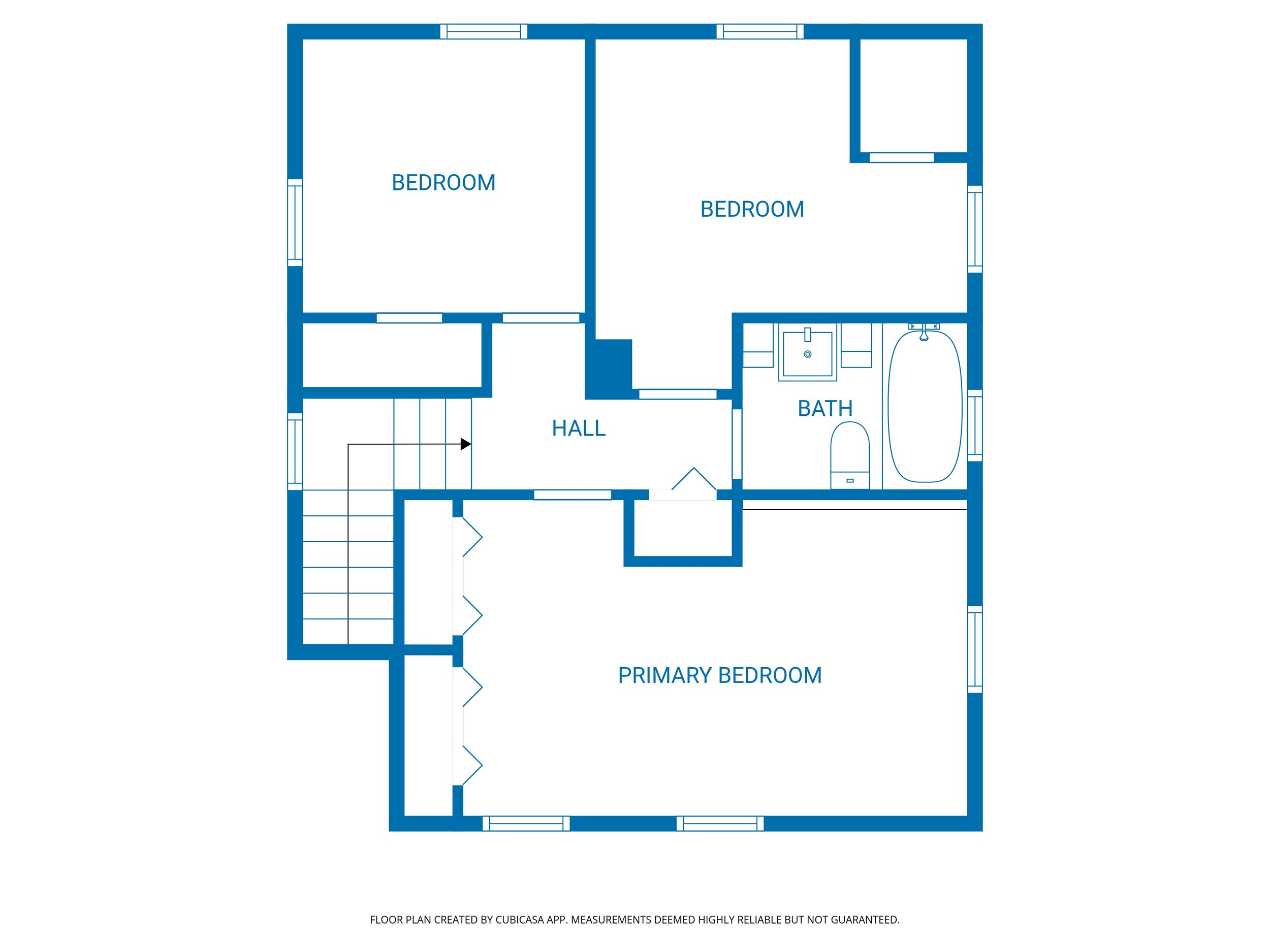 Floor plan of a house's upper level showing three bedrooms, a bathroom, an entry hall, and a stairway.