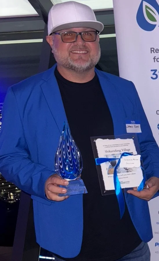 Integrity Meter Solutions founder accepting the NextConservation 2025 award