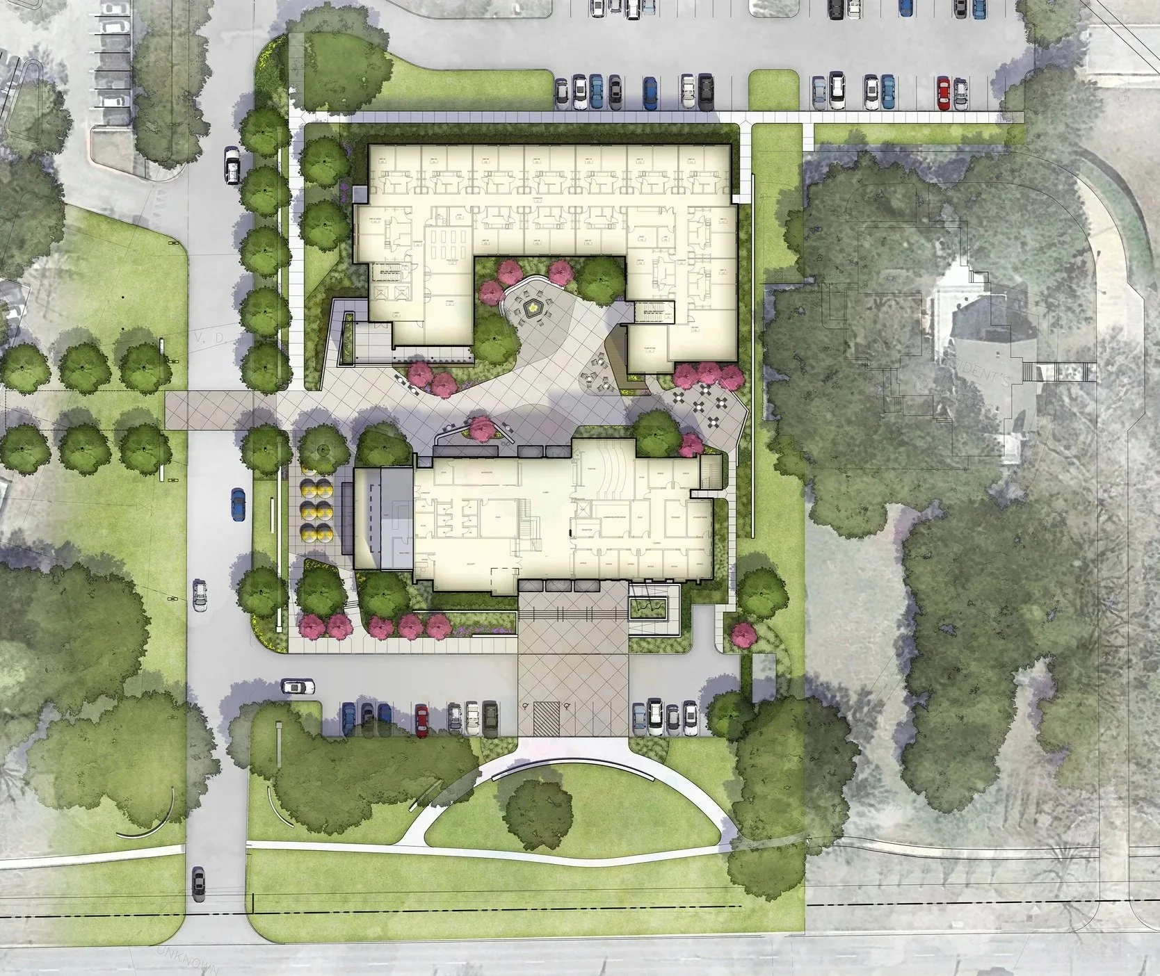 A detailed architectural site plan of a building surrounded by green spaces, parking lots, and walkways, showing the layout of the building's interior rooms and exterior landscaping.