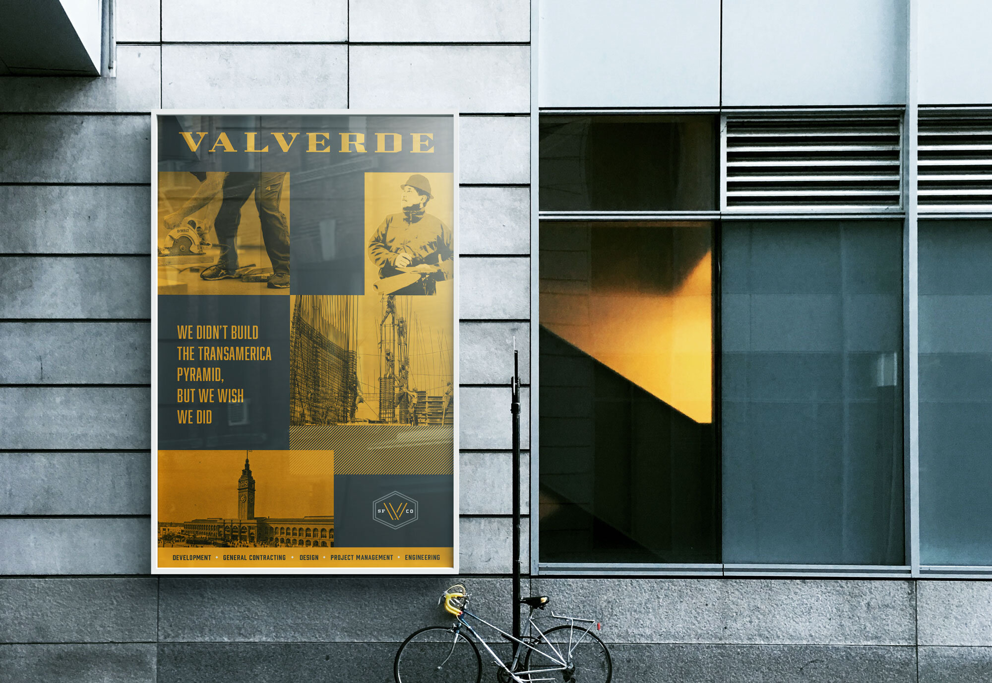 Exterior image of Valverde Construction branding on the side of a building in the daylight