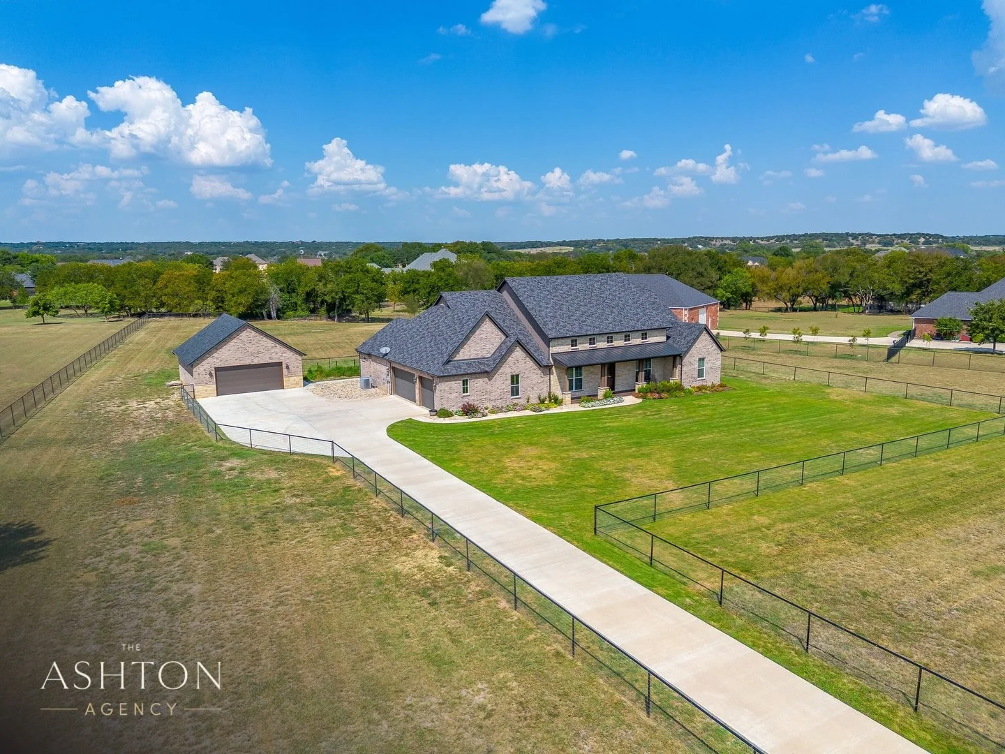 Where luxury meets wide-open Texas living.

Welcome to 420 Cattlebaron Parc Dr - a modern Hill Country - inspired home tucked inside the privately gated Cattlebaron Parc Estates. With soaring cathedral ceilings, a floor-to-ceiling stone fireplace, an