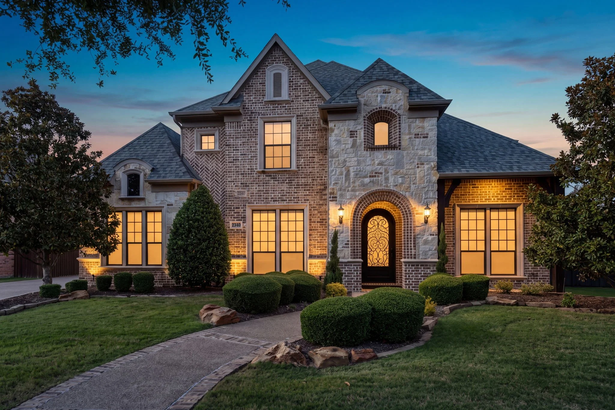 10-web-or-mls-2340ladycornwall-08-twilight-front-exterior.jpg