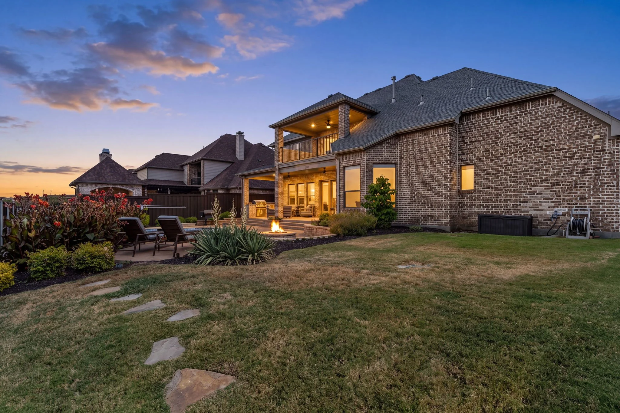 16-web-or-mls-2340ladycornwall-06-backyard-twilight.jpg
