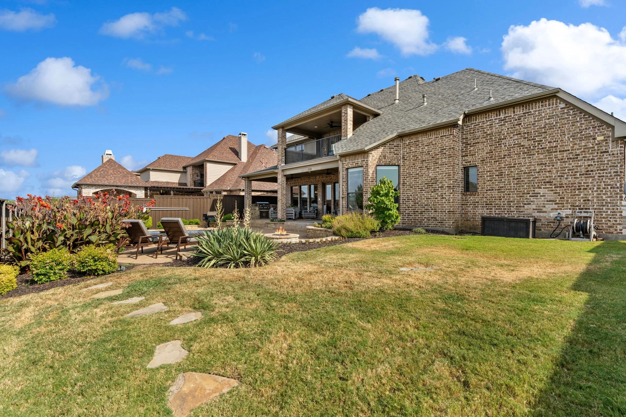 26-web-or-mls-2340ladycornwall-72-backyard-patio.jpg