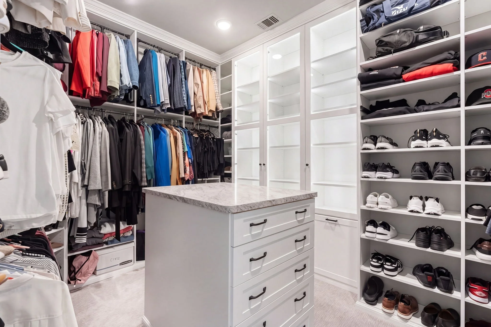 36-web-or-mls-2340ladycornwall-51-primary-closet.jpg