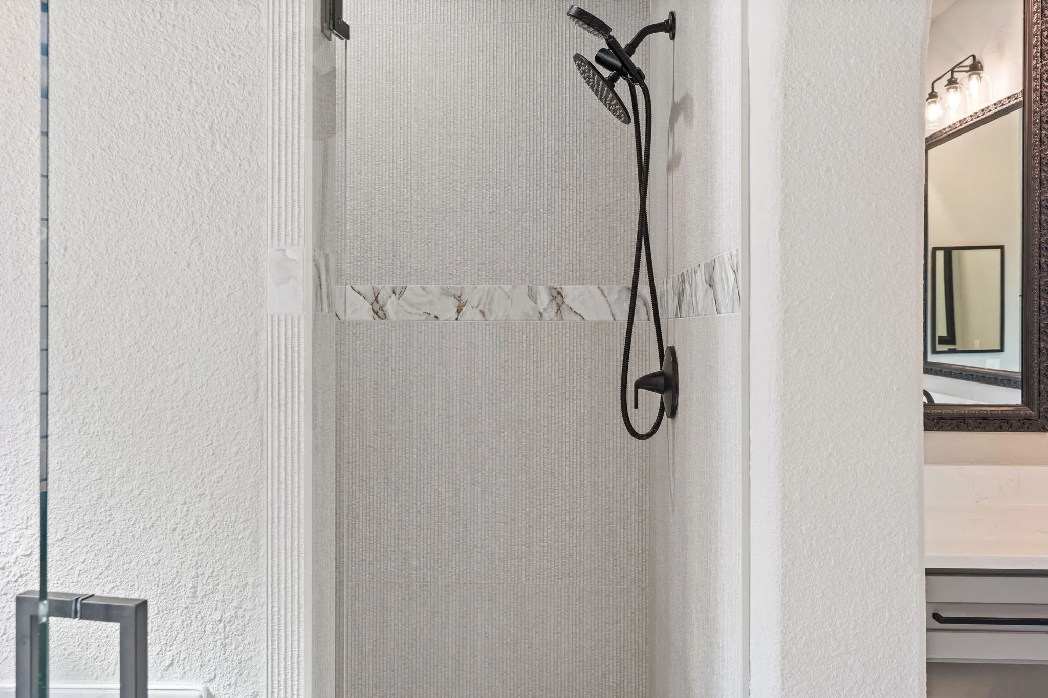 74-web-or-mls-2340ladycornwall-46-primary-shower.jpg