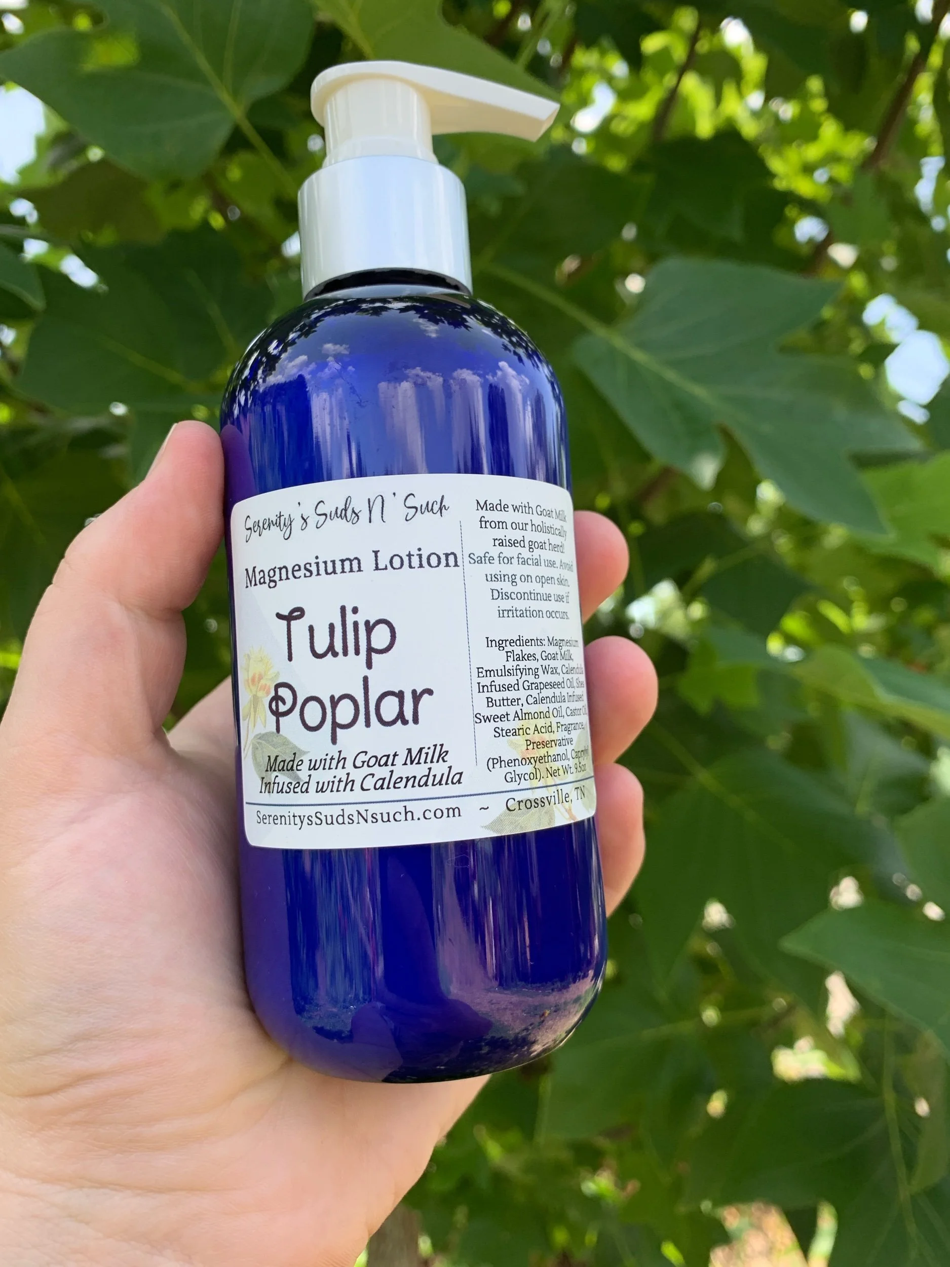 Blue bottle of Magnesium Goat Milk Lotion
