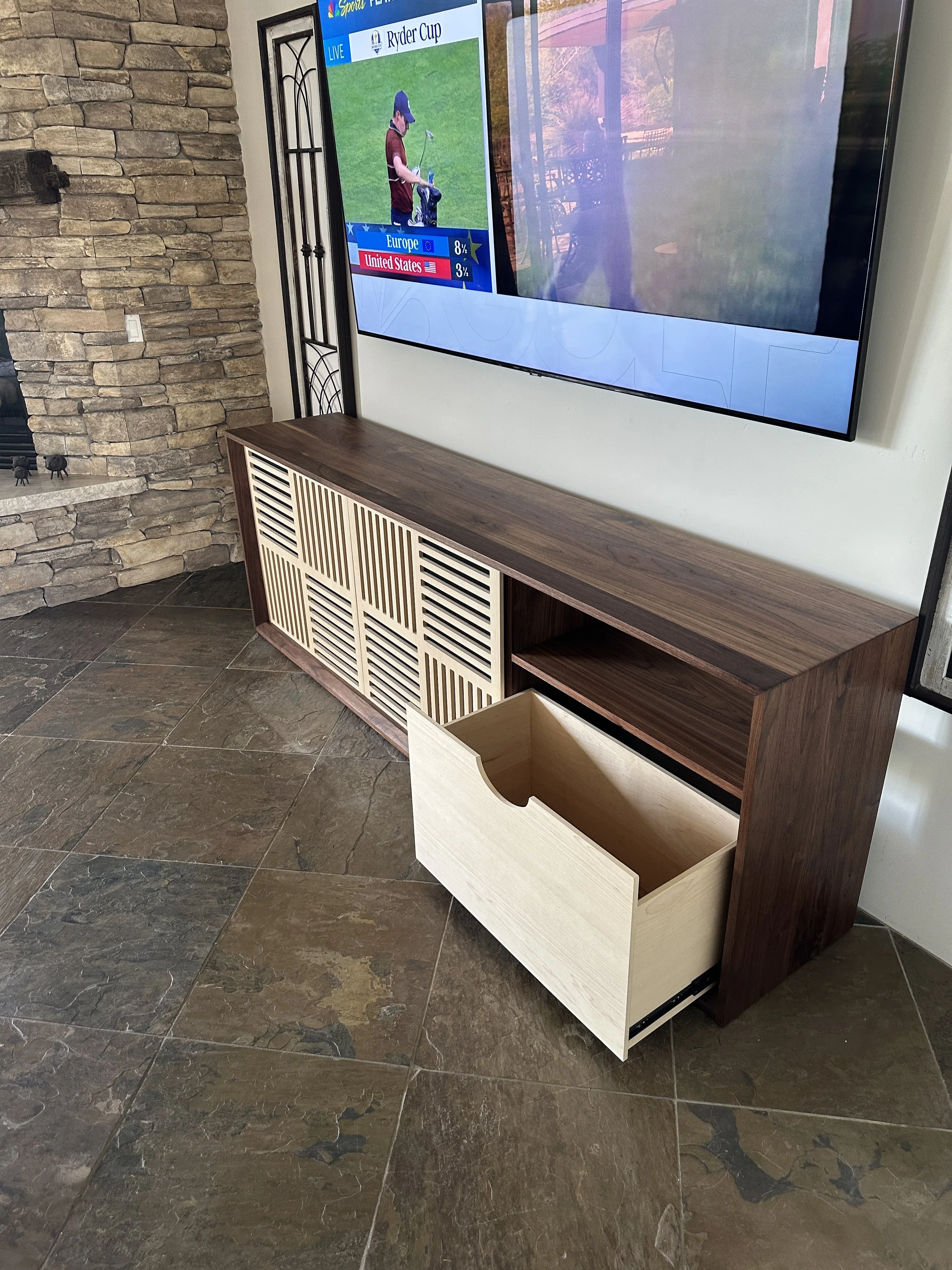 walnut media cabinet with walnut drawer and walnut sliding doors