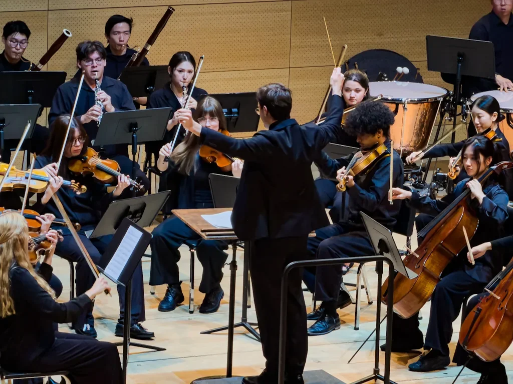 Mannes Orchestra performing Charles Ives Variations on America at The New School before the Walter Isaacson talk