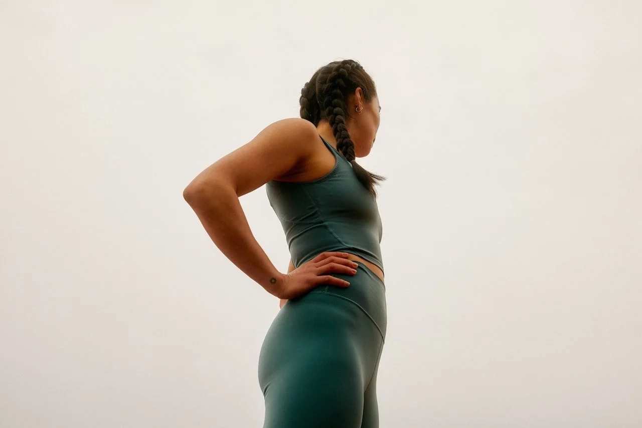 Woman standing outdoors with confidence, reflecting personalized hormone care, healthy aging, and long-term wellness support at Maryam Reproductive Health + Wellness.