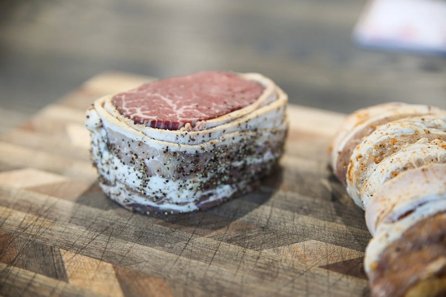 Get your bacon-wrapped filet mignon and chicken breasts at TCB!