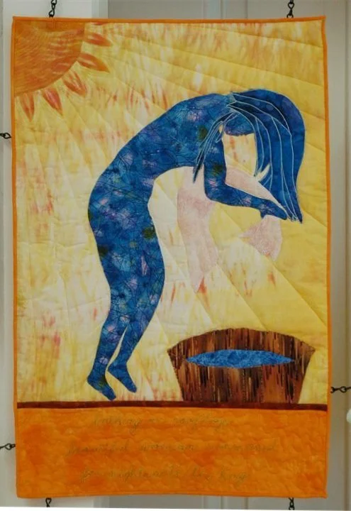 Quilt with a blue heron standing near a small pond with sunlight background.