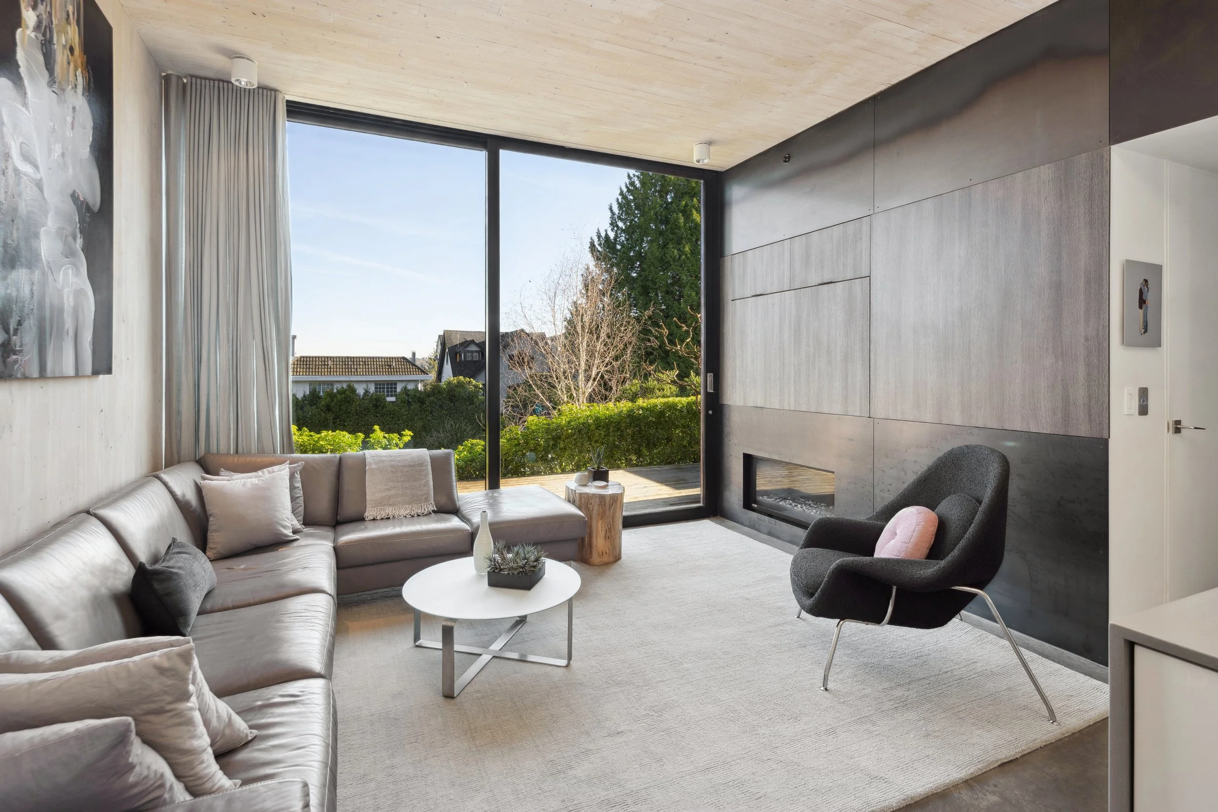 hidden-studio-dpo-clt-courtyard-house-living-room-fireplace.jpg