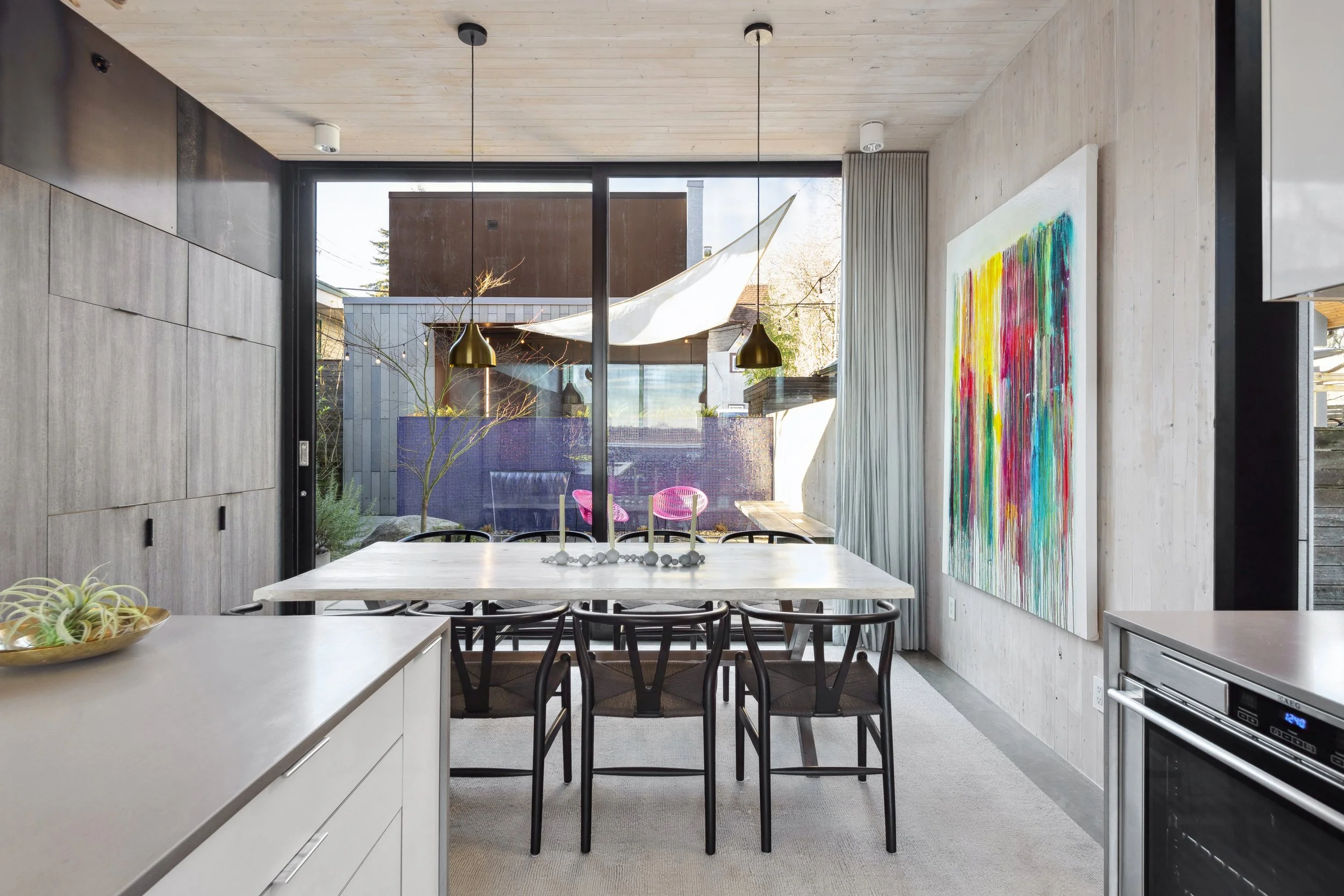 hidden-studio-dpo-clt-courtyard-house-dining-backyard.jpg