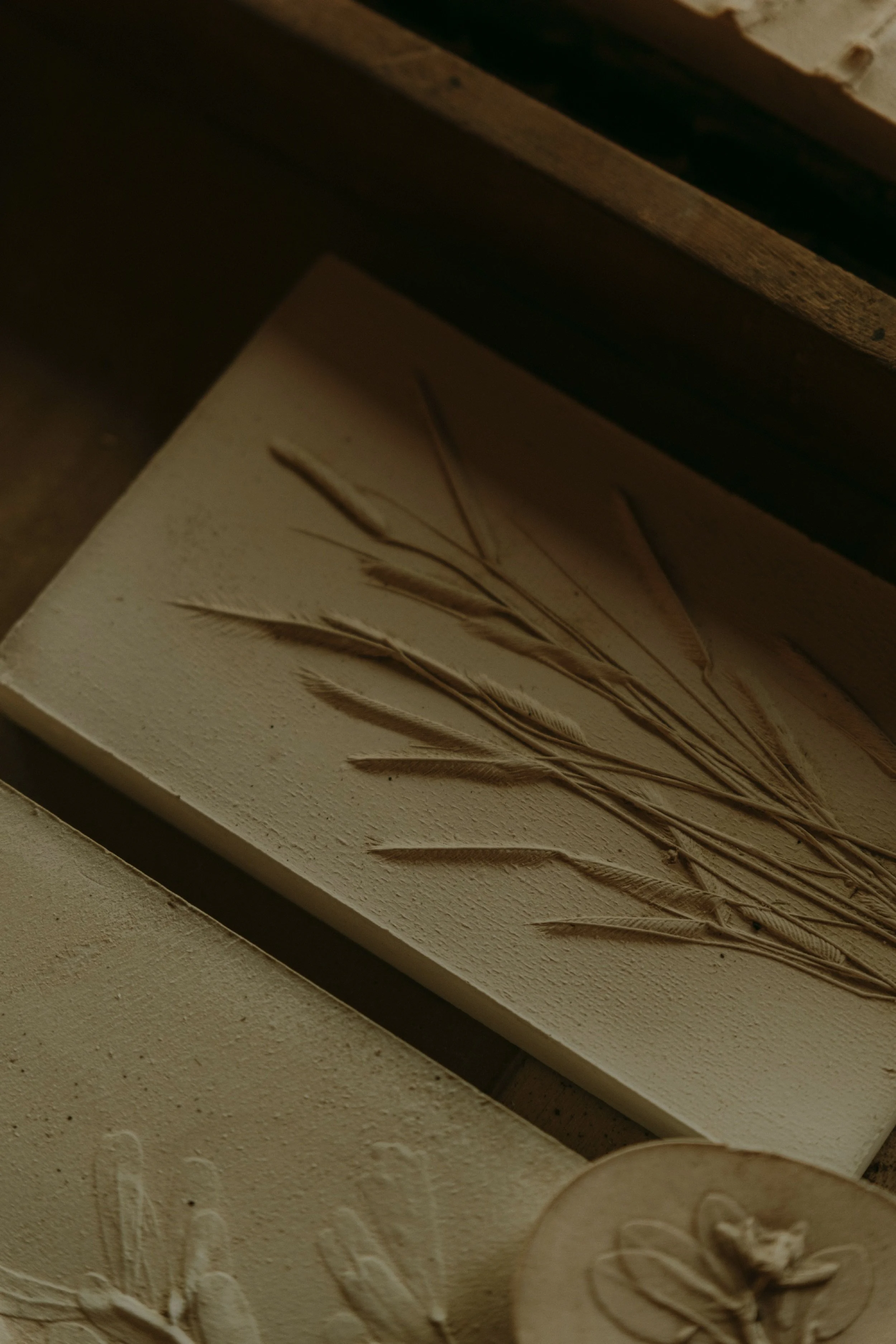 Grama oats cast in sage water. Set in plaster on textured wild clay.
