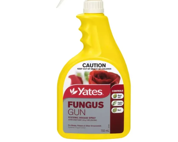 Yellow spray bottle labeled Yates Fungus Gun systemic disease spray for roses, flowers, and other ornamentals.