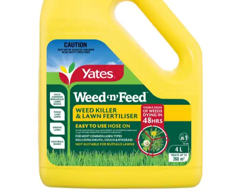 Yellow container of Yates Weed'n'Feed weed killer and lawn fertilizer with green, red, blue, and white label.
